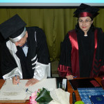Signing the Book of Honor